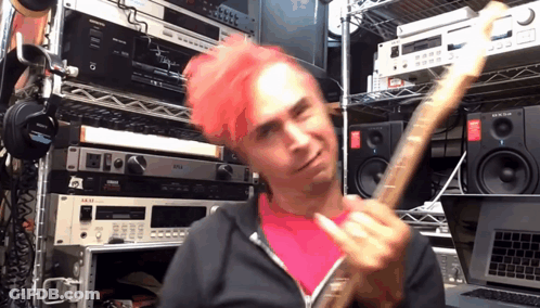 Pink-Haired Man Playing Guitar By Akai Rack GIF