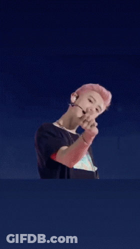 Pink-Haired Person With Microphone And Headphones GIF