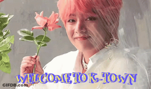 Pink Haired Woman Holding Flower GIF