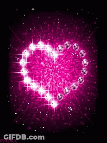 Pink Heart Surrounded By Diamonds GIF