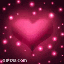 Pink Heart Surrounded By Pink Lights GIF