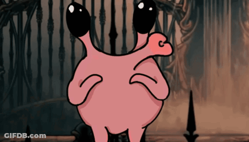 Pink Monster With Black Eyes And C On Cheek GIF