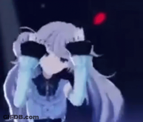 Pink Monster With Purple Eyes And Symbol On Face GIF