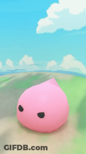Pink Object With Black Eyes On Grassy Field GIF