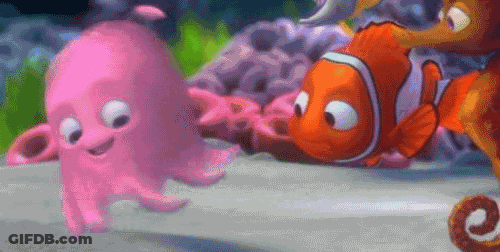 Pink Octopus Next To Clown Fish GIF