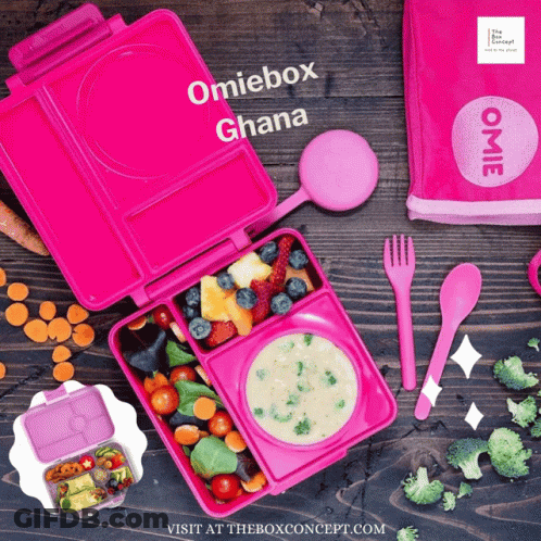 Pink Omiebox Ghana On Wooden Table With Food And Utensils GIF