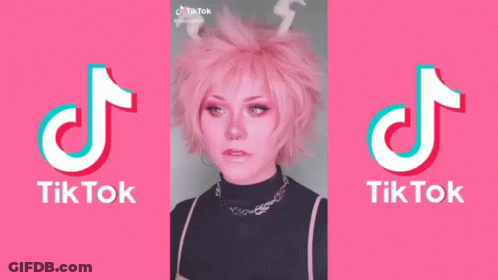 Pink Penguin Saying Thank You With Red Hearts GIF