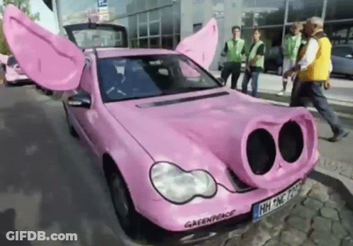 Pink Pig Car With Greenpeace Logo GIF
