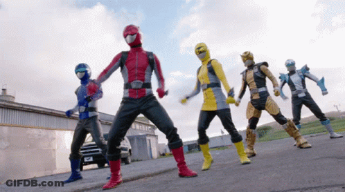 Pink Power Rangers Fighting On Black Background GIF