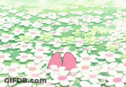 Pink Rabbit With Flower On Head In Field Of Flowers GIF