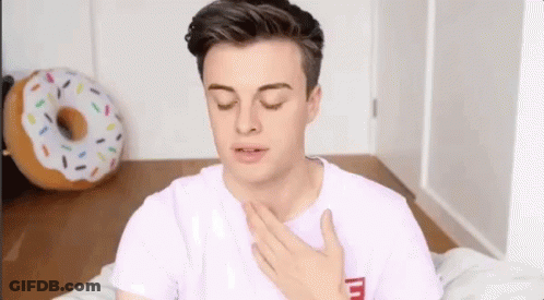 Pink Shirt Man Eyes Closed Hand On Chest GIF