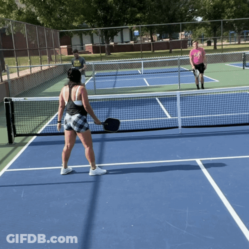 Pink Shirt Man Plaid Tank Woman Playing Tennis GIF