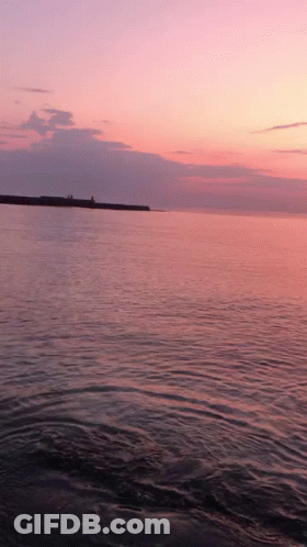 Pink Sky Sunset Over Ocean GIF