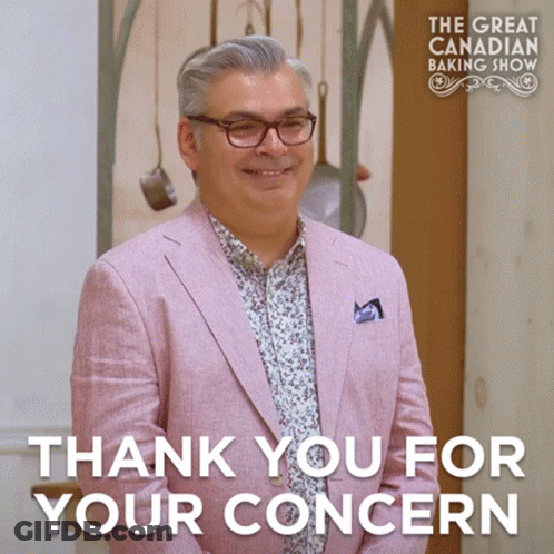 Pink Suit Man Smiling At Great Canadian Baking Show GIF