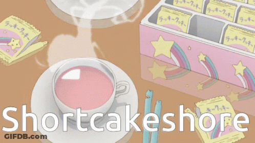 Pink Tea Cup Next To Shortcakes GIF