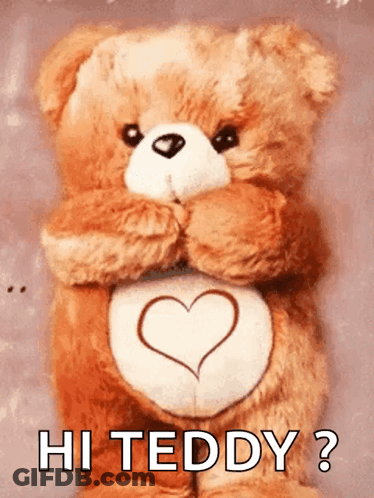 Pink Teddy Bear On Wooden Table GIF