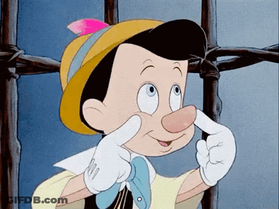 Pinocchio Is Making A Funny Face With His Hands GIF