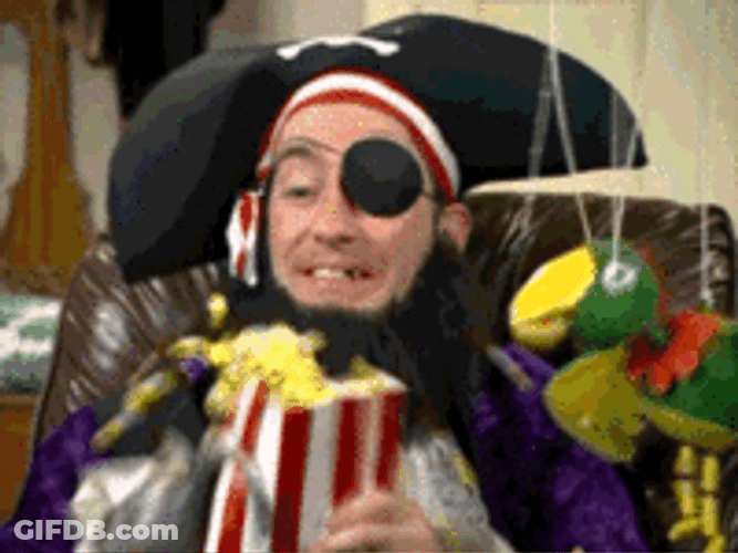 Pirate Frantically Eating Popcorn Meme GIF