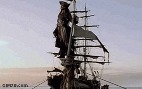 Pirate Ship With Captain Jack Sparrow Statue On Mast GIF
