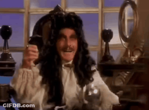 Pirate Sitting At Desk Holding Wine GIF