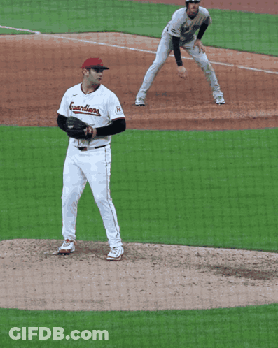 Pitcher Number 7 About To Throw Ball GIF