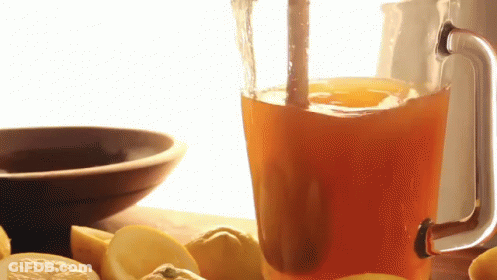 Pitcher Of Lemonade With Sliced Lemons And Bowl Of Tea GIF
