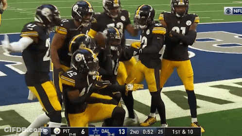 Pittsburgh Steelers Football Players Celebrate A Touchdown During A Game GIF