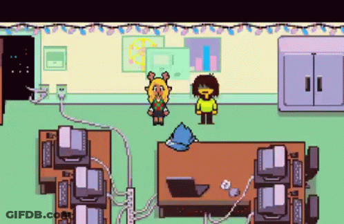 Pixel Art Girl And Boy Standing Next To Computers GIF