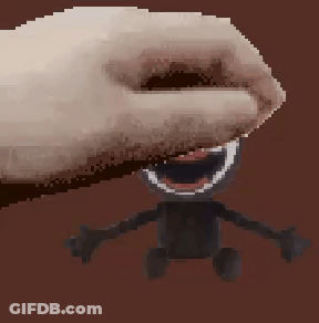 Pixel Art Hand Holding Smiling Toy GIF