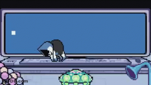 Pixel Art Person Sitting At Computer GIF