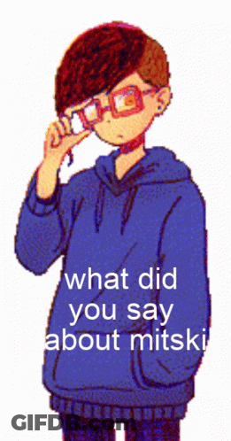 Pixelated Boy In Glasses And Blue Hoodie Saying What Did You Say About Mitski GIF