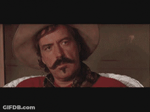 Pixelated Cowboy Man With Mustache Says Bye GIF