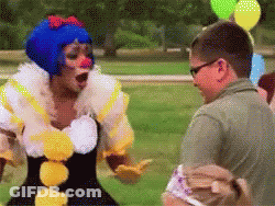 Pixelated Man And Woman Dressed As Clowns GIF