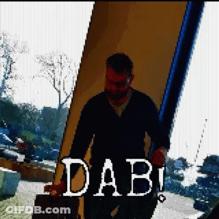 Pixelated Man Carrying Suitcase With Word Dabi GIF