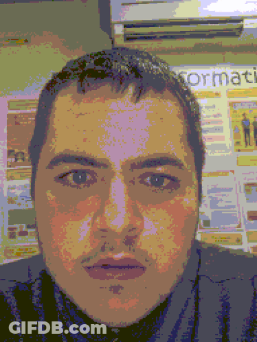 Pixelated Man Face In Front Of Bulletin Board Saying Normati GIF