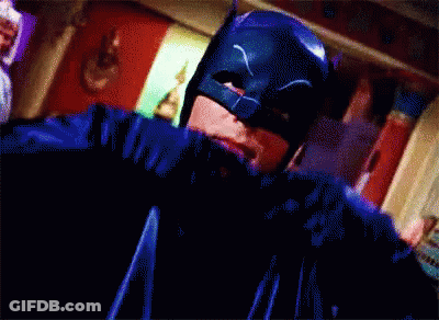 Pixelated Man In Bat Suit GIF