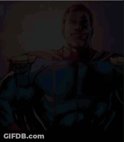 Pixelated Man In Blue And Gold Superhero Costume GIF