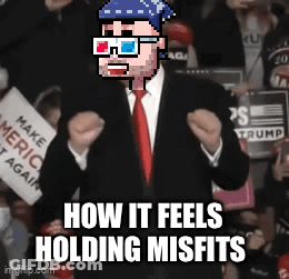Pixelated Man In Suit Holding Misfits GIF