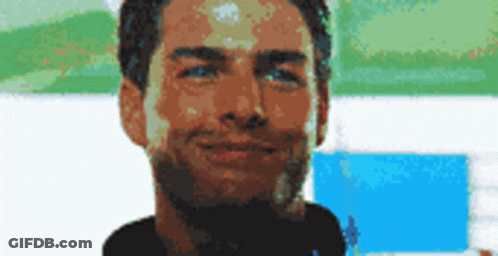Pixelated Man With Beard And Blue Eyes GIF