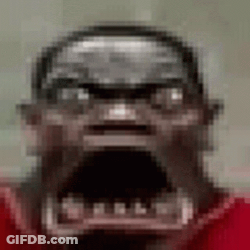 Pixelated Man With Beard Helmet Red Shirt GIF