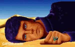 Pixelated Man With Blue Eyes Laying In Sand GIF