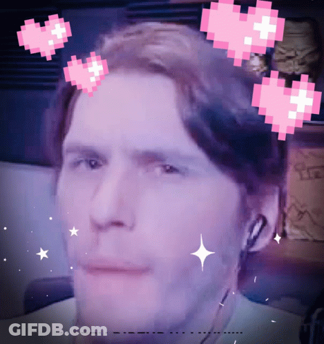 Pixelated Man With Hearts Around Head GIF