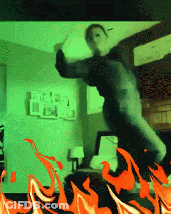 Pixelated Person Dancing With Flames GIF
