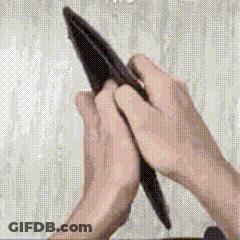 Pixelated Person Holding Pen GIF