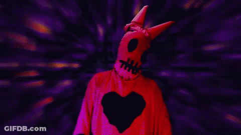 Pixelated Person In Red Horned Costume GIF