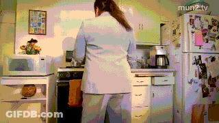 Pixelated Woman In Kitchen With Mun2tv GIF