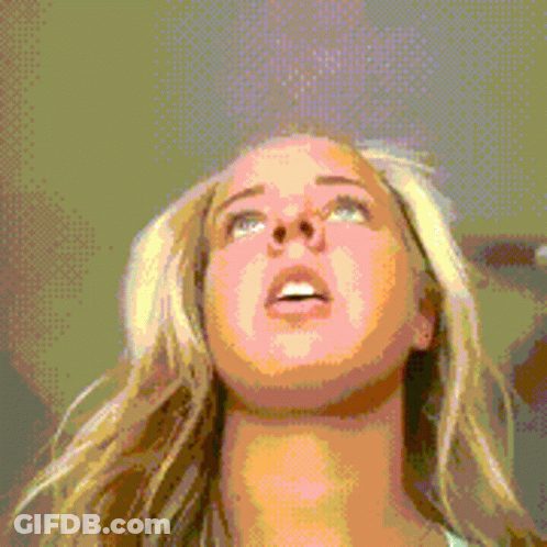Pixelated Woman Looking Up GIF