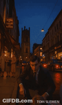 Pixelated Woman With Tom Slemen At Top GIF