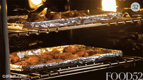 Pizza Cooking On Grill In Circle GIF