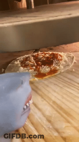 Pizza With Tomato Sauce And Cheese Cooking GIF